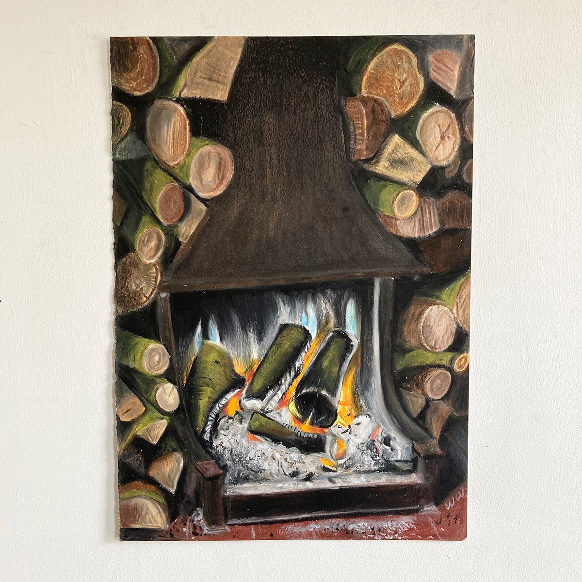 Image shows a drawing by Wilfrid Wood of a fireplace filled with flames and wood, surrounded by piles of logs